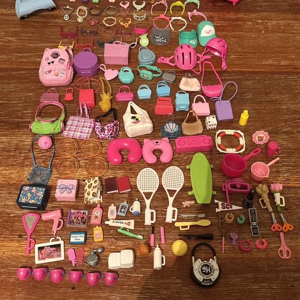 Mixed Toy Lot Barbie Dolls Random Accessories Assorted 150 pieces.